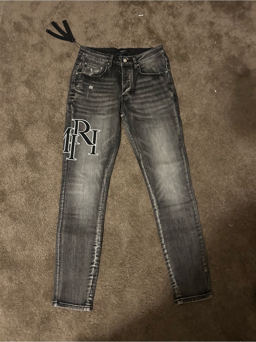 Amiri Monogram Script Logo Washed Black Stacked Skinny Jeans